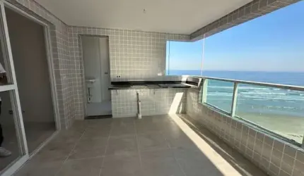 Alto padrão frente em prédio frente mar com 3 quartos, 1 suíte, 2 vagas na Praia Grande-SP,
