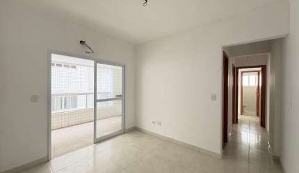 Aluguel de apartamento de 2 quartos com 2 salas e 2 vagas de garagem em Caiçara, Praia Grande-SP - 79,00 m².