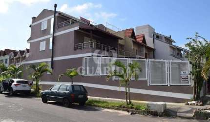 Casa com 3 quartos à venda na Rua Heitor Kramer, 370, Guarujá, Porto Alegre por R$ 529.000