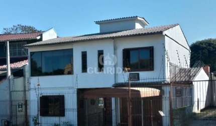 Casa com 3 quartos à venda na Avenida Valado, 158, Vila João Pessoa, Porto Alegre por R$ 600.000