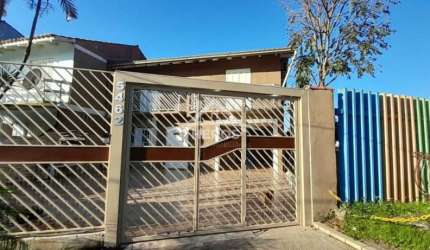 Casa em condomínio fechado com 3 quartos à venda na Avenida Edgar Pires de Castro, 5806, Restinga, Porto Alegre por R$ 700.000