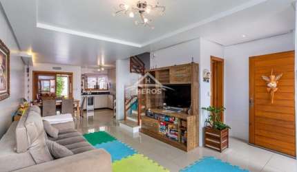 Casa com 3 quartos à venda na Rua dos Caiaguais, 265, Espírito Santo, Porto Alegre por R$ 749.000