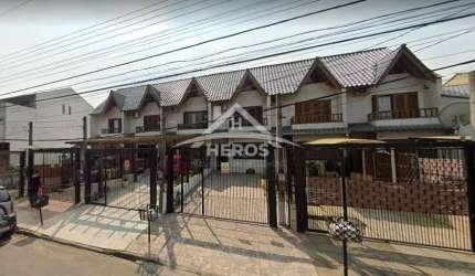 Casa com 3 quartos à venda na Rua Heitor Kramer, 254, Guarujá, Porto Alegre por R$ 600.000