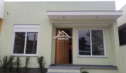 Casa com 3 quartos à venda na Rua Criciúma, 35, Guarujá, Porto Alegre por R$ 425.000