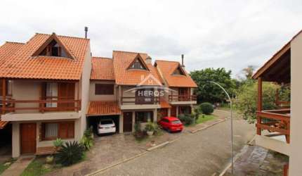 Casa em condomínio fechado com 3 quartos à venda na Avenida Orleaes, 105, Guarujá, Porto Alegre por R$ 645.000