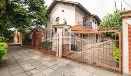 Casa em condomínio fechado com 3 quartos à venda na Rua Dona Zulmira, 353, Cavalhada, Porto Alegre por R$ 550.000