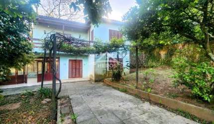 Casa com 4 quartos à venda na Rua Monte Claro, 74, Hípica, Porto Alegre por R$ 470.000