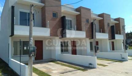 Casa em condomínio fechado com 3 quartos à venda na Rua Francisco Mattos Terres, 565, Aberta dos Morros, Porto Alegre por R$ 470.000