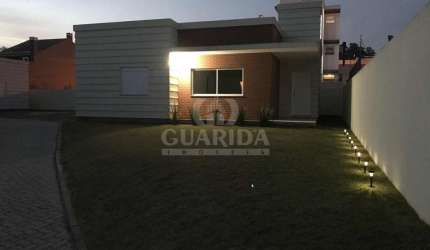 Casa em condomínio fechado com 3 quartos à venda na Rua Canísio Binsfeld, 226, Hípica, Porto Alegre por R$ 645.000