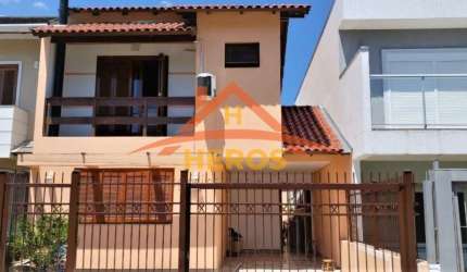 Casa em condomínio fechado com 3 quartos à venda na Rua Pau Brasil, 34, Hípica, Porto Alegre por R$ 550.000