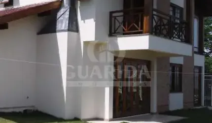 Casa com 3 quartos à venda na Estrada das Furnas, 706, Vila Nova, Porto Alegre por R$ 1.350.000