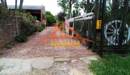 Casa com 3 quartos à venda na Rua Dorival Castilhos Machado, 1357, Hípica, Porto Alegre por R$ 290.000
