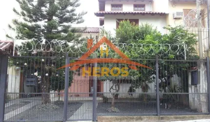 Casa com 3 quartos à venda na Rua Jerolomo Minuzo, 296, Vila Nova, Porto Alegre por R$ 500.000