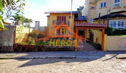Casa com 3 quartos à venda na Rua Esteio, 200, Cavalhada, Porto Alegre por R$ 650.000
