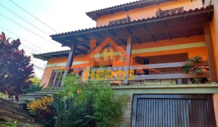 Casa com 5 quartos à venda na Rua Ângelo Passuelo, 79, Vila Nova, Porto Alegre por R$ 650.000
