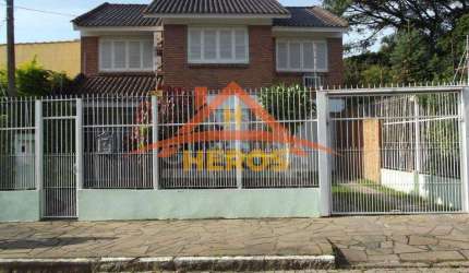 Casa com 3 quartos à venda na Rua Carlos Ferreira, 34, Teresópolis, Porto Alegre por R$ 950.000