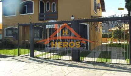 Casa com 3 quartos à venda na Rua Inhanduí, 340, Cristal, Porto Alegre por R$ 1.378.000
