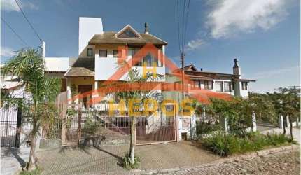 Casa com 3 quartos à venda na Rua Comendador José Júlio de Mello, 184, Teresópolis, Porto Alegre por R$ 1.450.000