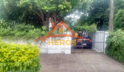 Casa com 5 quartos à venda na Avenida Quaraí, 327, Nonoai, Porto Alegre por R$ 450.000