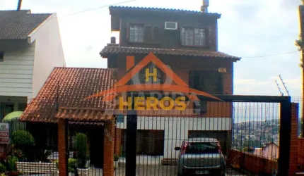 Casa com 4 quartos à venda na Rua Fernando Osório, 740, Teresópolis, Porto Alegre por R$ 780.000