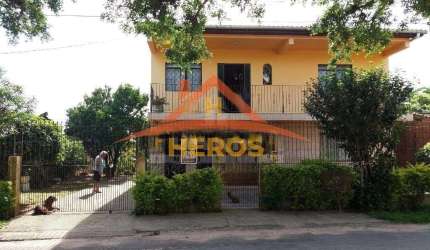 Casa com 6 quartos à venda na Rua Laranjeiras, 119, Restinga, Porto Alegre por R$ 530.000