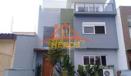 Casa com 3 quartos à venda na Rua Nestor José Nitschke, 240, Guarujá, Porto Alegre por R$ 795.000