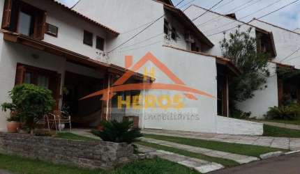 Casa em condomínio fechado com 3 quartos à venda na Avenida Eduardo Prado, 695, Cavalhada, Porto Alegre por R$ 750.000