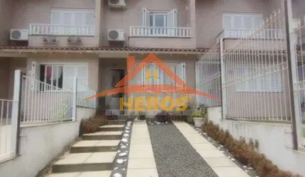 Casa com 2 quartos à venda na Rua Heitor Kramer, 314, Guarujá, Porto Alegre por R$ 450.000