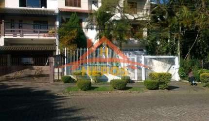 Casa com 4 quartos à venda na Rua Imeram Teixeira Cabeleira, 79, Aberta dos Morros, Porto Alegre por R$ 950.000