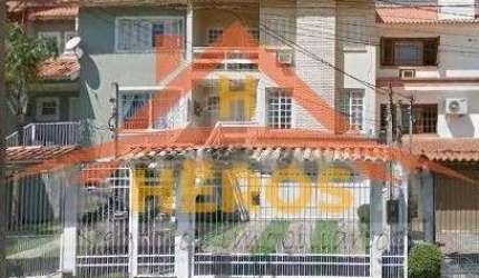 Casa com 3 quartos à venda na Rua Professor Antônio José Remião, 309, Espírito Santo, Porto Alegre por R$ 700.000