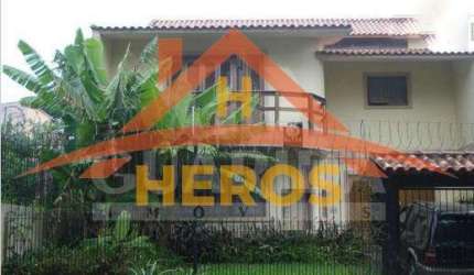 Casa com 4 quartos à venda na Rua Telmo Vieira de Araújo, 40, Hípica, Porto Alegre por R$ 460.000