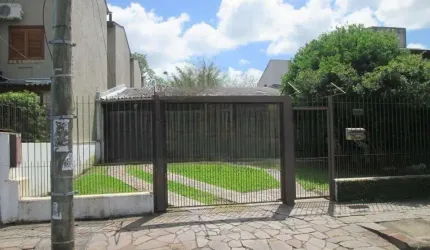 Casa em condomínio fechado com 3 quartos à venda na Avenida Guarujá, 136, Guarujá, Porto Alegre por R$ 480.000