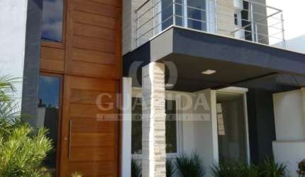 Casa em condomínio fechado com 3 quartos à venda na Rua Carlos Maximiliano Fayet, 300, Hípica, Porto Alegre por R$ 742.000