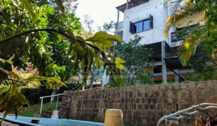 Casa com 5 quartos à venda na Avenida Vicente Monteggia, 2231, Cavalhada, Porto Alegre por R$ 899.000