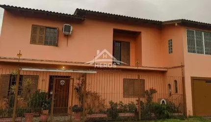 Casa com 4 quartos à venda na Beco Maria Alice, 40, Restinga, Porto Alegre por R$ 477.000