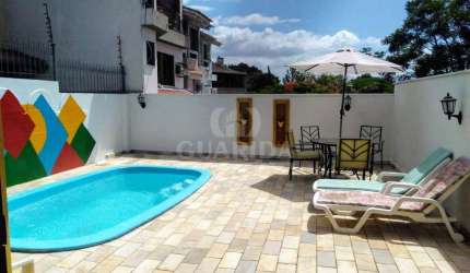 Casa com 4 quartos à venda na Rua Professor Antônio José Remião, 62, Espírito Santo, Porto Alegre por R$ 650.000