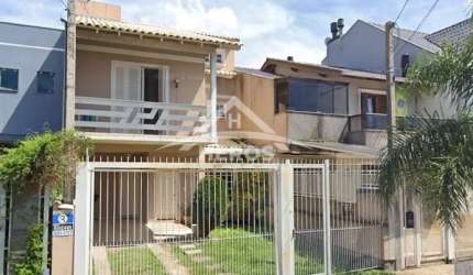 Casa em condomínio fechado com 3 quartos à venda na Rua Felipe Arísio, 96, Hípica, Porto Alegre por R$ 769.000
