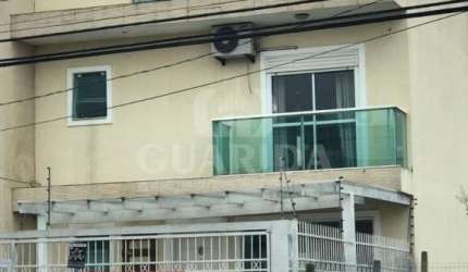Casa em condomínio fechado com 3 quartos à venda na Rua Guatambu, 67, Hípica, Porto Alegre por R$ 560.000