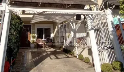 Casa com 2 quartos à venda na Rua Eva Pinto, 73, Hípica, Porto Alegre por R$ 550.000