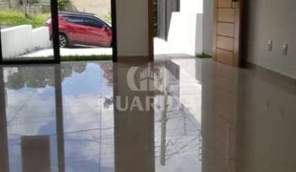 Casa com 2 quartos à venda na Rua Heitor Kramer, 704, Guarujá, Porto Alegre por R$ 465.000