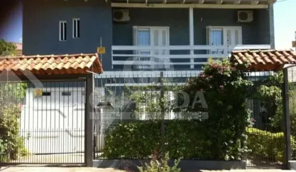 Casa com 4 quartos à venda na Rua Giruá, 63, Cavalhada, Porto Alegre por R$ 990.000