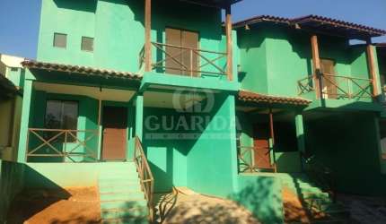 Casa em condomínio fechado com 3 quartos à venda na Avenida Vicente Monteggia, 1669, Cavalhada, Porto Alegre por R$ 495.000
