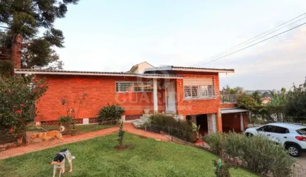 Casa com 3 quartos à venda na Rua Esteio, 219, Cavalhada, Porto Alegre por R$ 680.000