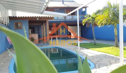 Casa com 4 quartos à venda na Rua Jerolomo Minuzo, 317, Vila Nova, Porto Alegre por R$ 800.000