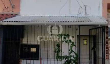 Casa em condomínio fechado com 2 quartos à venda na Avenida Capivari, 1353, Cristal, Porto Alegre por R$ 129.000