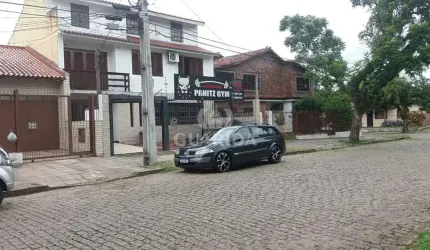 Casa com 3 quartos à venda na Rua Márcio Dias, 360, Nonoai, Porto Alegre por R$ 900.000