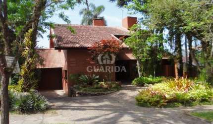 Casa com 3 quartos à venda na Avenida Arlindo Pasqualini, 575, Jardim Isabel, Porto Alegre por R$ 1.990.000