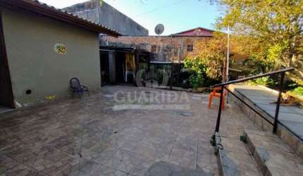 Casa com 3 quartos à venda na Rua Engenheiro Oscar de Oliveira Ramos, 4160, Restinga, Porto Alegre por R$ 265.000