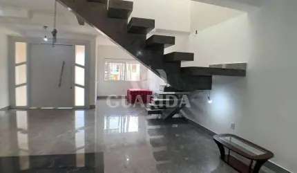 Casa com 2 quartos à venda na Rua Luzinete Alves Aragon, 528, Hípica, Porto Alegre por R$ 650.000