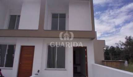 Casa com 2 quartos à venda na Rua Eroni Soares Machado, 473, Hípica, Porto Alegre por R$ 399.000